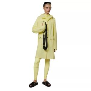 RAINS.   Inner drawstring CLASSY rain coat nwot. Xs/S